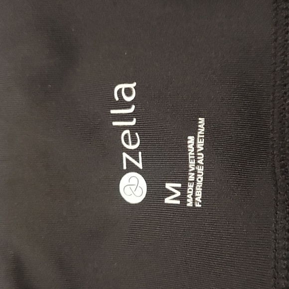 ZELLA Black Cropped Leggings with Perforated Hem and Pockets - Picture 8 of 13